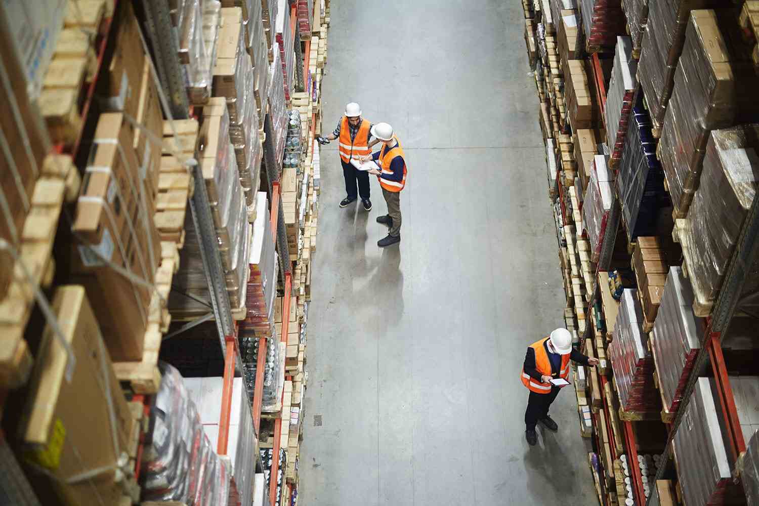 Workers inspecting warehouse 